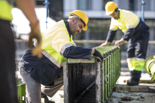 Bouwvakkers op de bouwplaats